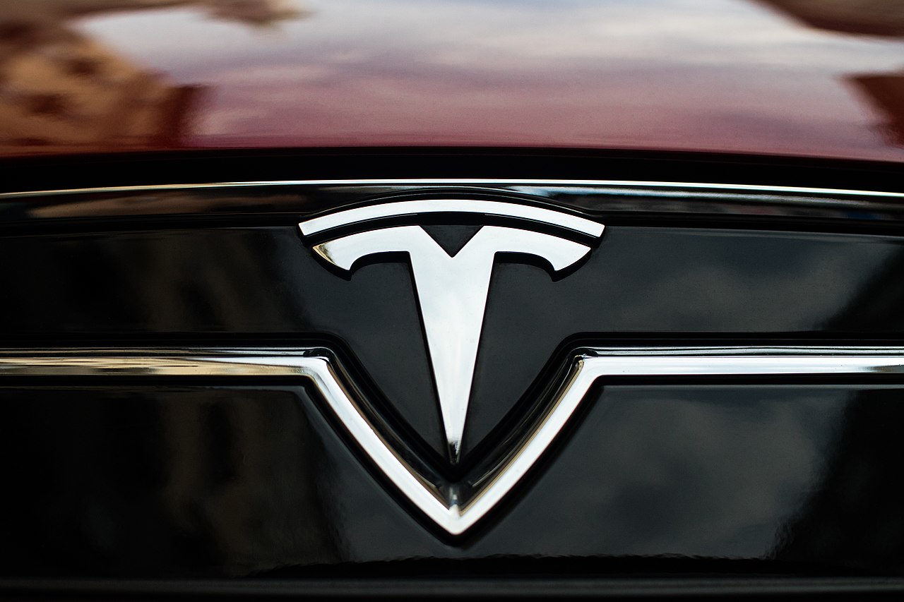 About The Tesla Logo Meaning And History Adlibweb 